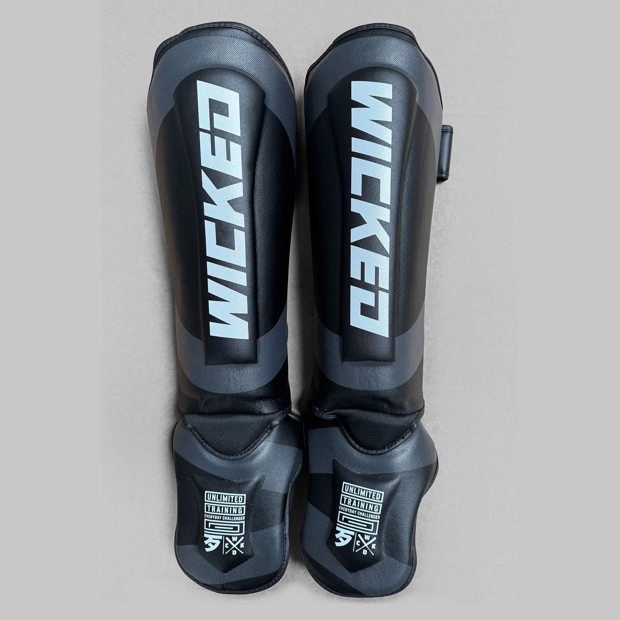 Protege Tibias Kruz Noir